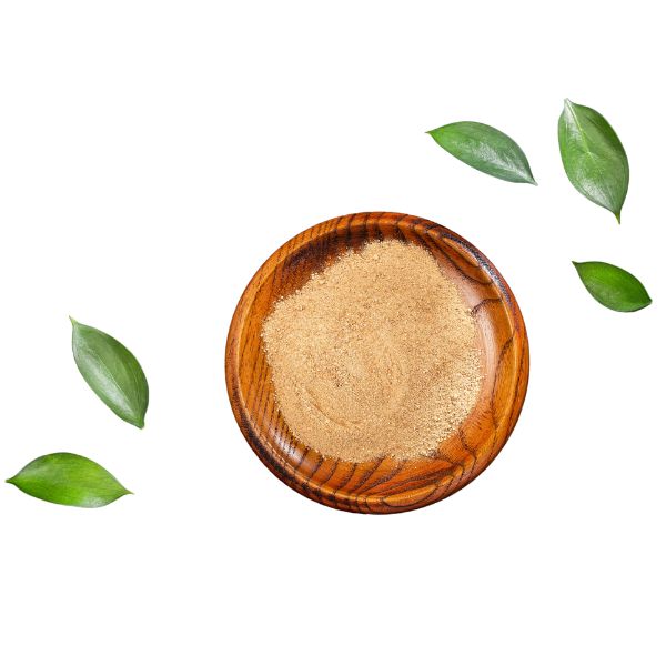 Eine kleine Holzschale gefüllt mit Maca-Pulver